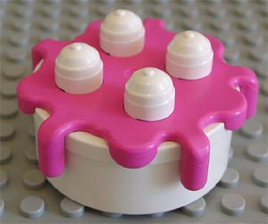 Duplo Food Cake with Medium Dark Pink Frosting in White
