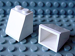 Brick Sloped 65° 2 x 2 x 2 Smooth without Bottom Tube in White