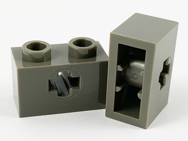 Technic Brick 1 x 2 with Axle Hole Type 1 [+ Opening] and Bottom Pin in Dark Gray