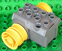 Duplo Toolo, Pullback Motor 3 x 4 with Yellow Wheels in Dark Gray