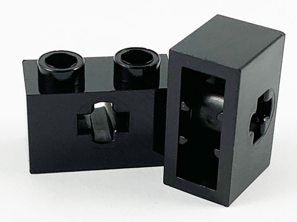 Technic Brick 1 x 2 with Axle Hole Type 1 [+ Opening] and Bottom Pin in Black
