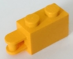 Brick Special 1 x 2 with Vertical Closed Handle Inset from Edge in Bright Light Orange