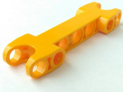 Technic Axle and Pin Connector 2 x 7 with Two Ball Joint Sockets in Bright Light Orange