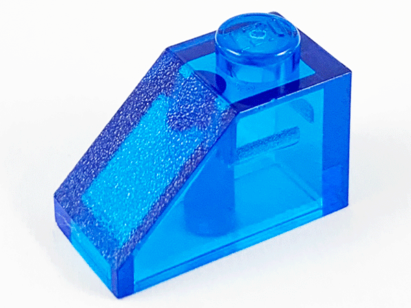 Brick Sloped 45° 2 x 1 with Bottom Pin in Trans-Dark Blue