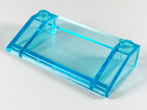 Brick Sloped 33° 3 x 6 in Trans-Light Blue