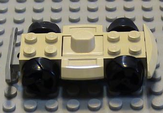 Vehicle Base 4 x 6 Racer Base with Black Wheels in Tan