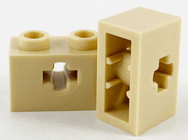 Technic Brick 1 x 2 with Axle Hole Type 1 [+ Opening] and Bottom Pin in Tan