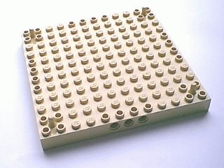 Brick Special 12 x 12 with 3 Pin Holes on Each Side and Vertical Peg at Each Corner in Tan