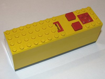 Battery Box, 9V 4 x 14 x 4 with Dark Bluish Gray Base [Complete Assembly] in Yellow