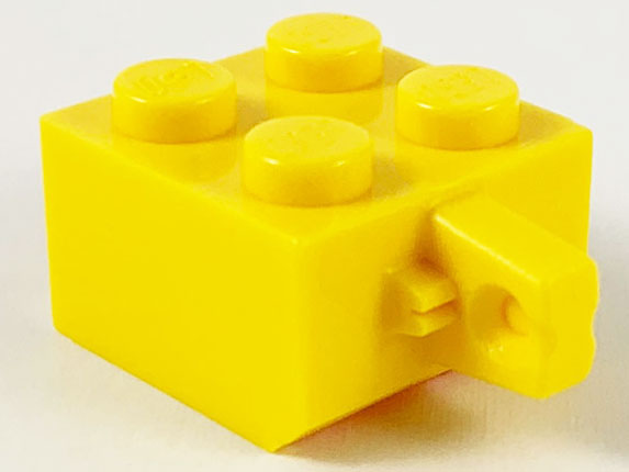 Hinge Brick 2 x 2 Locking with 1 Finger Vertical and Axle Hole [X Opening] in Yellow
