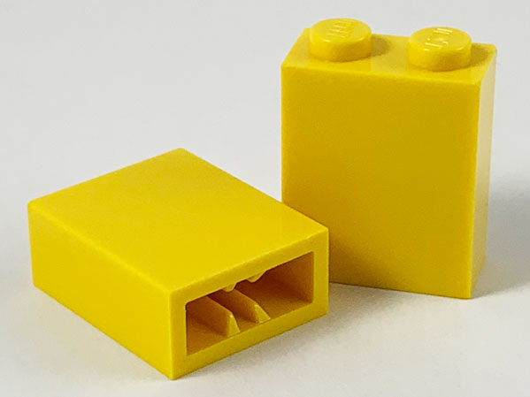 Brick 1 x 2 x 2 with Inside Axle Holder in Yellow
