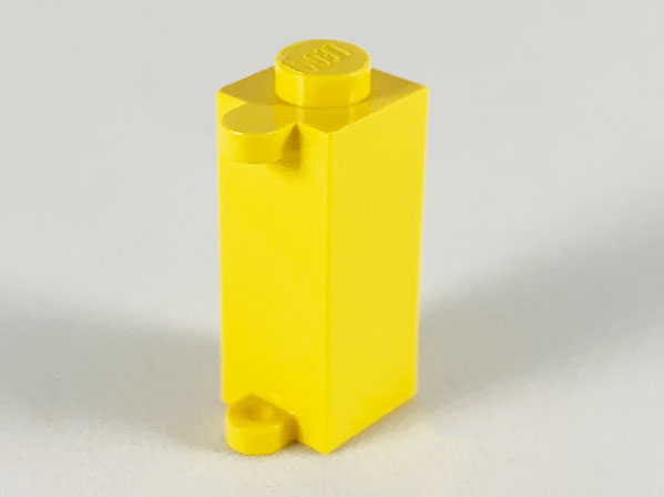 Brick Special 1 x 1 x 2 with Shutter Holder in Yellow