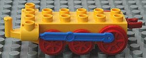 Duplo Train Chassis with Blue Drive Rod and Red Wheels in Yellow