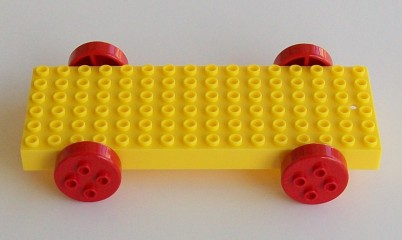 Vehicle Base, Minitalia Brick Special 16 x 6 with 4 wheels in Yellow