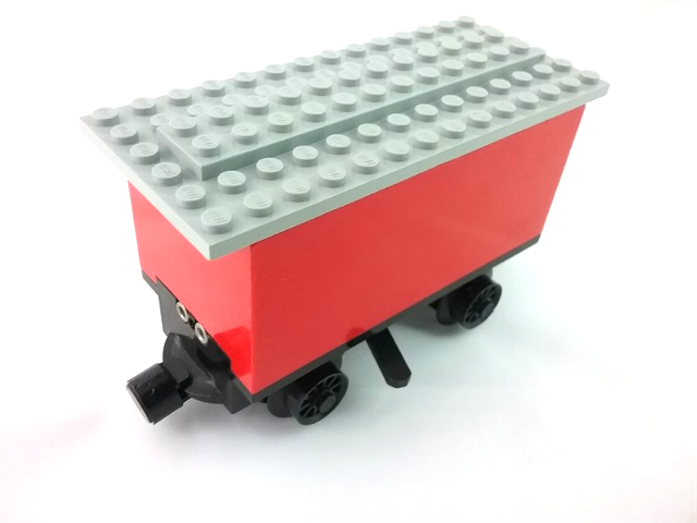 Battery Box, Train Car with Black Base, Black Wheels and Magnets in Red