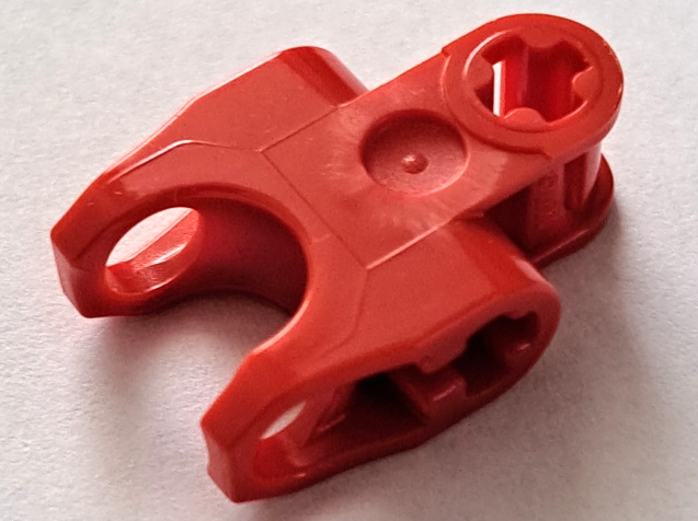 Technic Axle Connector 2 x 3 with Ball Socket [Closed Sides, Squared Ends, Open Lower Axle Holes] in Red