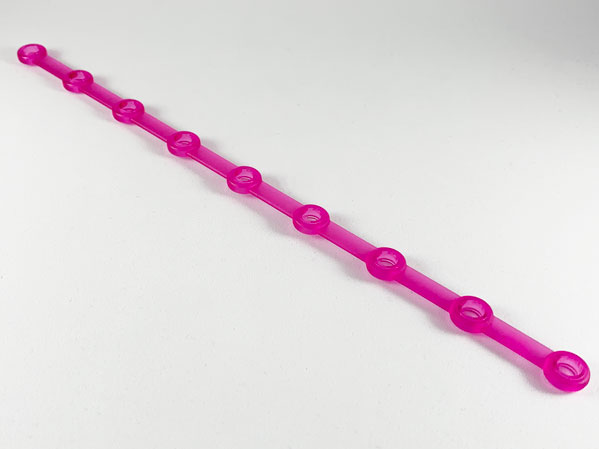 Clikits Connector, Rod 1 x 25 with 9 Holes in Trans-Dark Pink