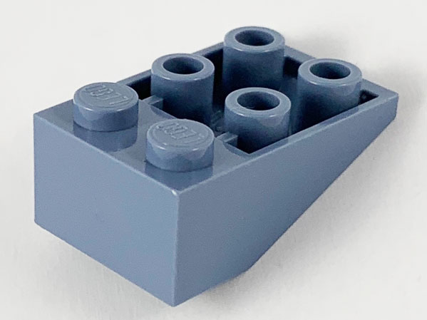 Brick Sloped Inverted 33° 3 x 2, No Connections between Studs, Ovoid Bottom Pin in Sand Blue