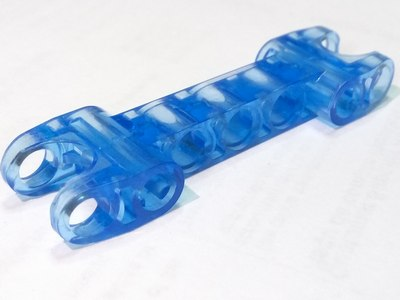 Technic Axle and Pin Connector 2 x 7 with Two Ball Joint Sockets in Trans-Medium Blue