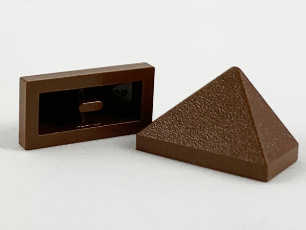Brick Sloped 45° 2 x 1 Triple with Ovoid Bottom Pin in Brown