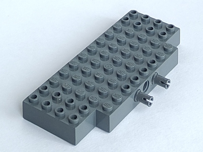 Brick Special 5 x 12 with Two 1 x 2 Cutouts, 1 Hole and 2 Fixed Rotatable Friction Pins on Side in Dark Bluish Gray