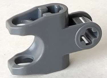 Technic Axle Connector 2 x 3 with Ball Socket [Closed Sides, Squared Ends, Open Lower Axle Holes] in Dark Bluish Gray