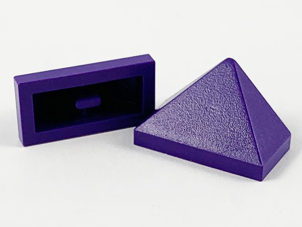 Brick Sloped 45° 2 x 1 Triple with Ovoid Bottom Pin in Dark Purple