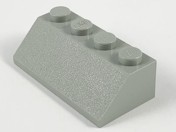 Brick Sloped 45° 2 x 4 in Light Gray