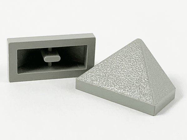 Brick Sloped 45° 2 x 1 Triple with Ovoid Bottom Pin in Light Gray