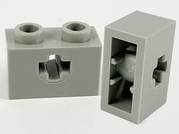 Technic Brick 1 x 2 with Axle Hole Type 1 [+ Opening] and Bottom Pin in Light Gray