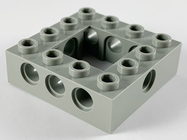 Technic Brick 4 x 4 with 2 x 2 Opening in Light Gray