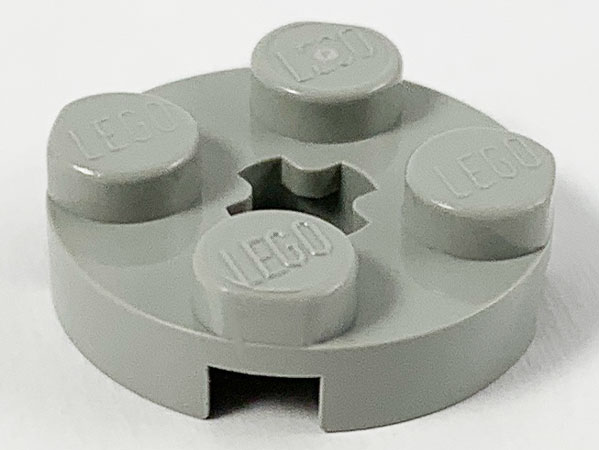 Plate Round 2 x 2 with Axle Hole Type 1 (+ Opening) in Light Gray
