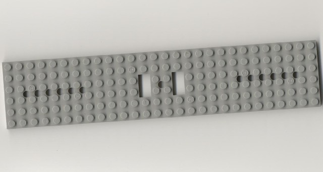 Vehicle Base, Train 6 x 28 with Two 1 x 2 Openings [6 Round Holes Each End and 1 Round Hole at Center] in Light Gray